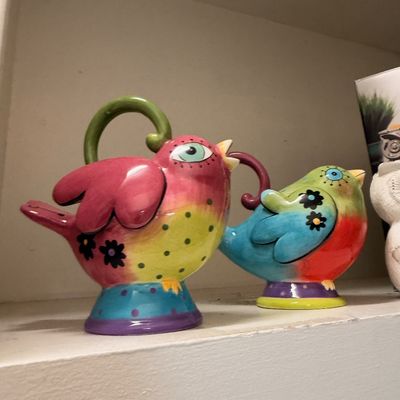 Hand painted ceramic bird teapot and figurine