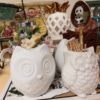 White ceramic owl planters, panda souvenir spoon