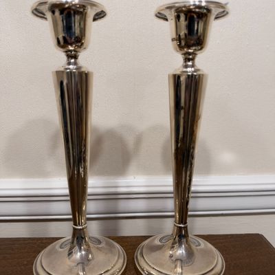 Pair of silver tone candlesticks
