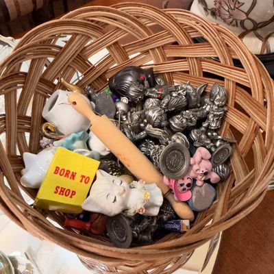 Basket of pewter miniature figurines and novelties