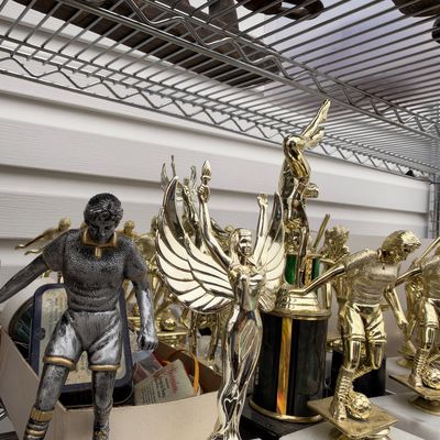 Vintage sports trophies, gold figures