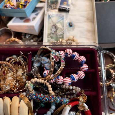 Beaded bracelets and costume jewelry in box