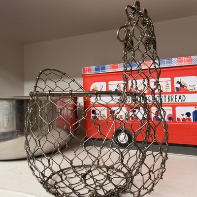 Wire egg basket and London bus shortbread tin
