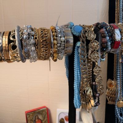 Bangles, stretch bracelets and bead necklaces on stand