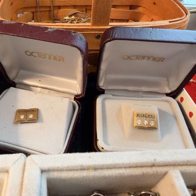 Gold tone stud earrings in presentation boxes