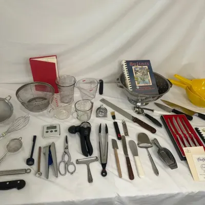 Kitchen Utensils Knives Strainers and Cookbook Collection
