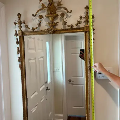 Ornate Gold Gilt Wall Mirror with Floral Crest