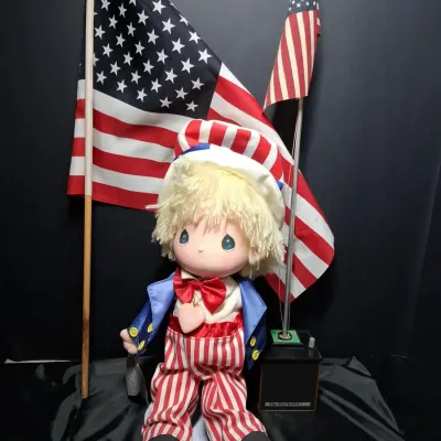 Animated Patriotic Uncle Sam Doll with American Flag