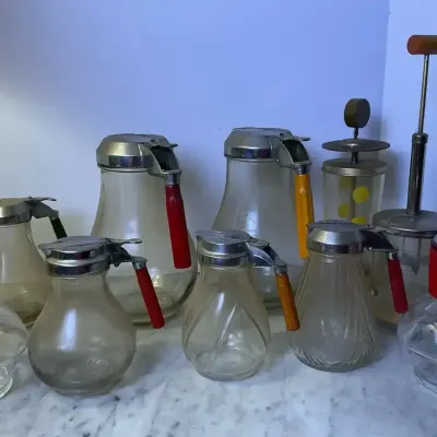 Vintage Kitchen Nut Chopper, Water Carafe, And syrup Jugs 