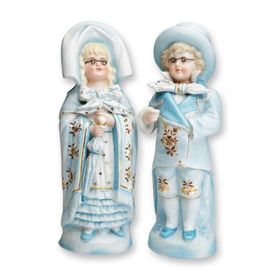 Pair of Gebruder Heubach German Bisque Porcelain Spectacle Figurines