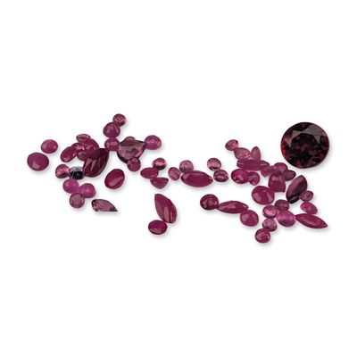 Assortment of Loose Red and Pink Faceted Gemstones