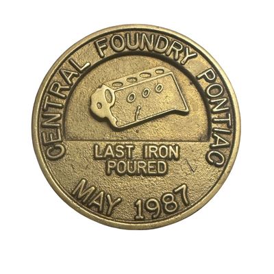 These commemorative disks were cast and given to employees to mark the permanent closure of the Pontiac plant.