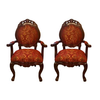 (BRAND NEW) Victorian-style accent armchairs featuring carved dark wood frames and rich red and gold patterned upholstery.