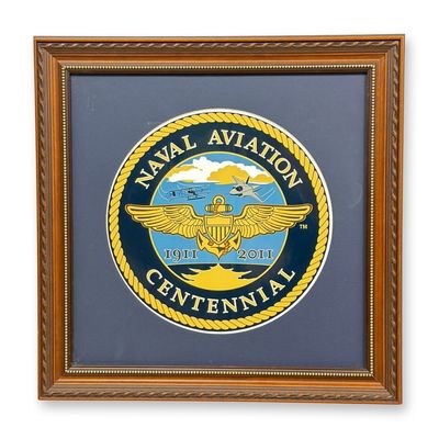 Sale Photo Thumbnail #142: Framed Plaque of the Official Logo and Commemorative Seal for the Centennial of Naval Aviation