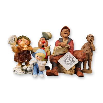 Sale Photo Thumbnail #323: A Group of Five Newspaper Figurines