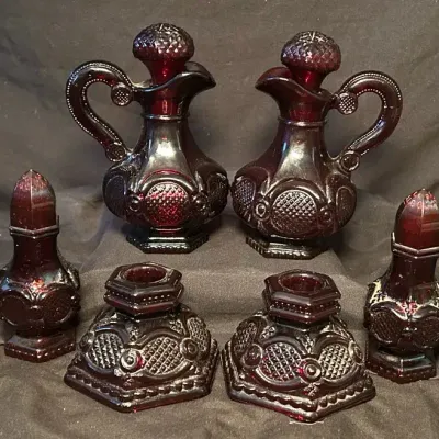 Avon Ruby Red Cruets, Salt And Pepper Shakers, And Candlesticks