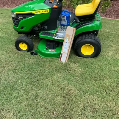 John Deere S100 Riding Lawn Mower with 42 Inch Deck and Accessories