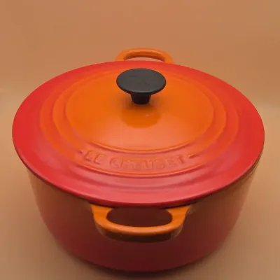 Le Creuset Enameled Cast Iron Round Dutch Oven in Iconic Flame Color