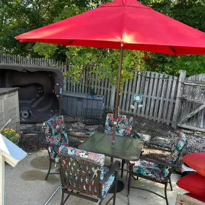 Outdoor Table, Chairs, And Umbrella Set.