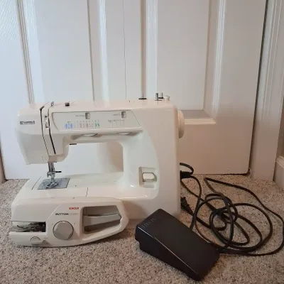 Sewing Machine And Button Magic