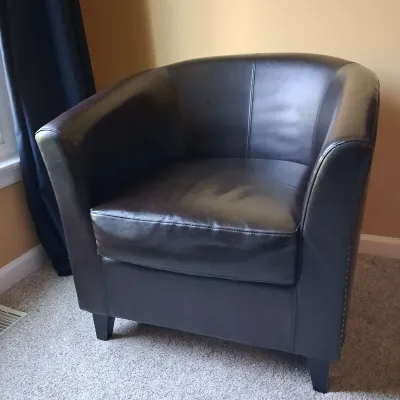 Rounded Back Leather Chair With Metal Studs