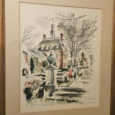 Framed and matted watercolor print depicting the Governor's Palace in Williamsburg, Virginia, signed by the artist in the lower right.