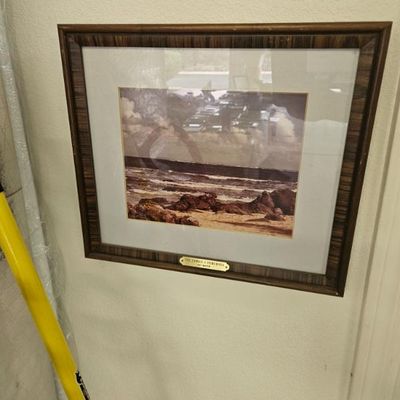 Framed landscape photograph titled "The Hawaii I Remember" by Roy M. Sato, featuring a rocky coastline scene in a matted wooden...