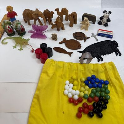 Vintage Toy & Novelty Lot with Hand-Carved Wooden Animals and Marbles plus round tin game board