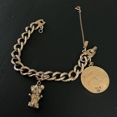 Vintage Monet Gold-Tone Charm Bracelet with Teddy Bear & Anniversary Charms