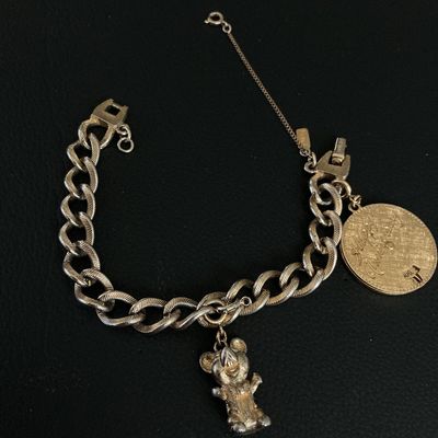 Vintage Monet Gold-Tone Charm Bracelet with Teddy Bear & Anniversary Charms
