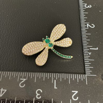 Gold-Tone Rhinestone Dragonfly Brooch with Green Accents