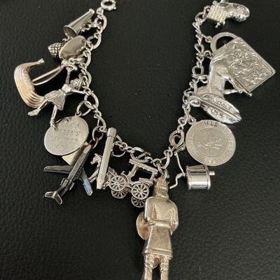 Vintage Sterling Silver Charm Bracelet with 15 Charms