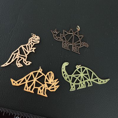 Geometric Dinosaur Pendant Charms - Set of 4
