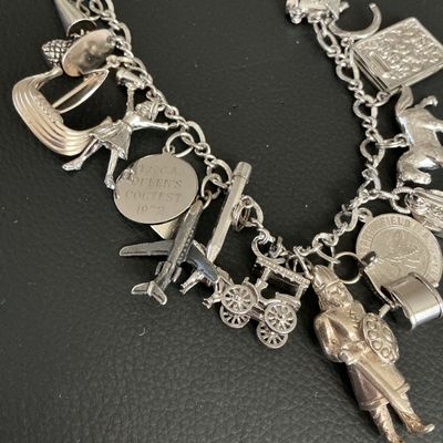 Vintage Sterling Silver Charm Bracelet with 15 Charms