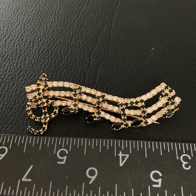 Vintage Gold Tone Rhinestone Musical Staff & Treble Clef Brooch