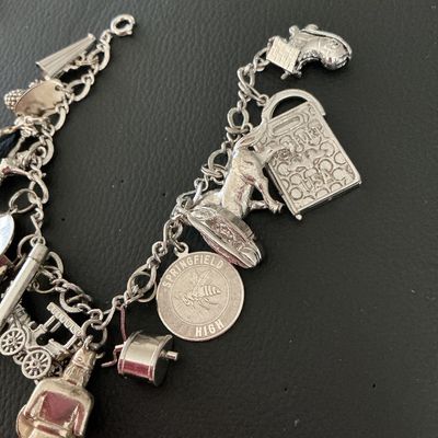 Vintage Sterling Silver Charm Bracelet with 15 Charms
