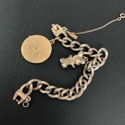 Vintage Monet Gold-Tone Charm Bracelet with Teddy Bear & Anniversary Charms