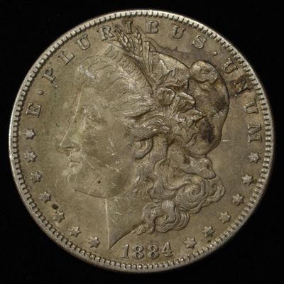 Sale Photo Thumbnail #62: 1884 MORGAN DOLLAR