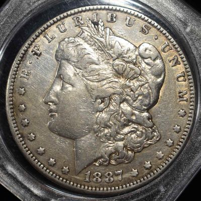 Sale Photo Thumbnail #197: 1887 MORGAN DOLLAR