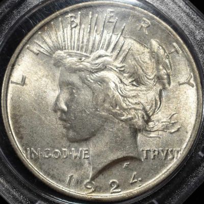 Sale Photo Thumbnail #211: 1924 PEACE DOLLAR W-FEATHERS