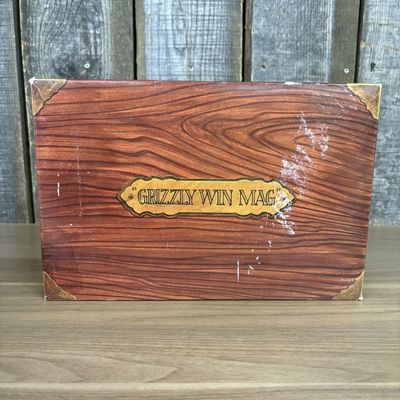 A Group of L.A.R. Grizzly Win Mag Pistol Packaging and Accessories