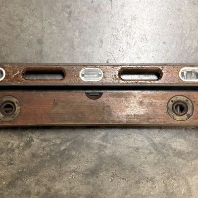 Two Antique Wooden and Brass Bound Levels Including Bluegrass Extra and Stanley