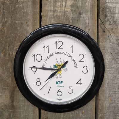 LG&E Advertising Wall Clock Featuring Louie the Lightning Bug Mascot