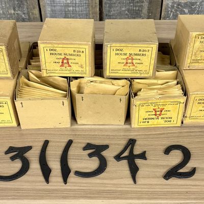 A Collection of Belknap Hardware & Mfg. Co. Cast Aluminum House Numbers in Original Packaging