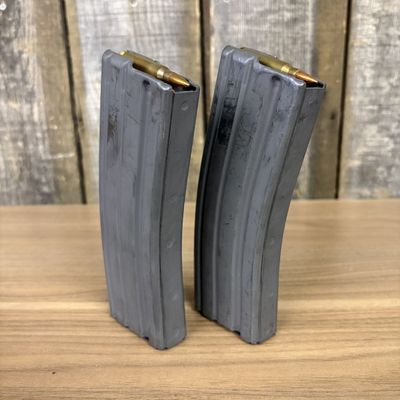 A Pair of Adventure Line Mfg. Co. 30-Round Aluminum Rifle Magazines