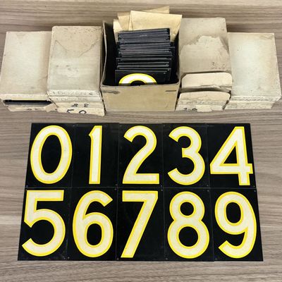 A Collection of Vintage Kursh Products Inc Reflective House Numbers