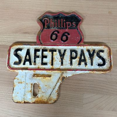 Phillips 66 Cast Iron Safety Pays License Plate Topper