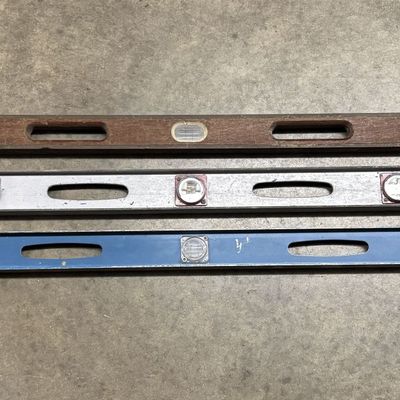 A Collection of Three Vintage Blue Grass 48-Inch Spirit Levels