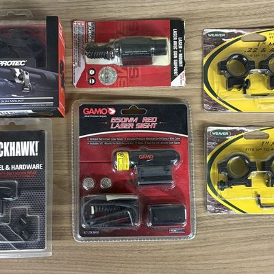 A Collection of Firearm and Airgun Accessories Including Gamo and Weaver Mounts and Sights