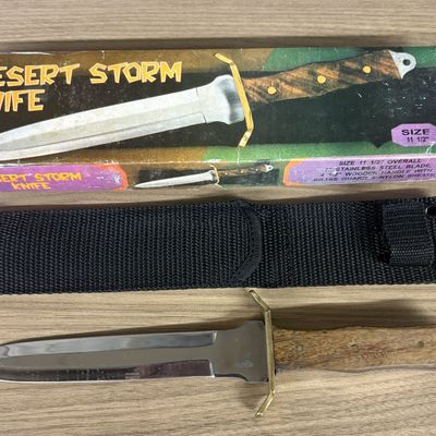 A Pakistan Stainless Steel Desert Storm Commemorative Dagger with Original Box and Sheath